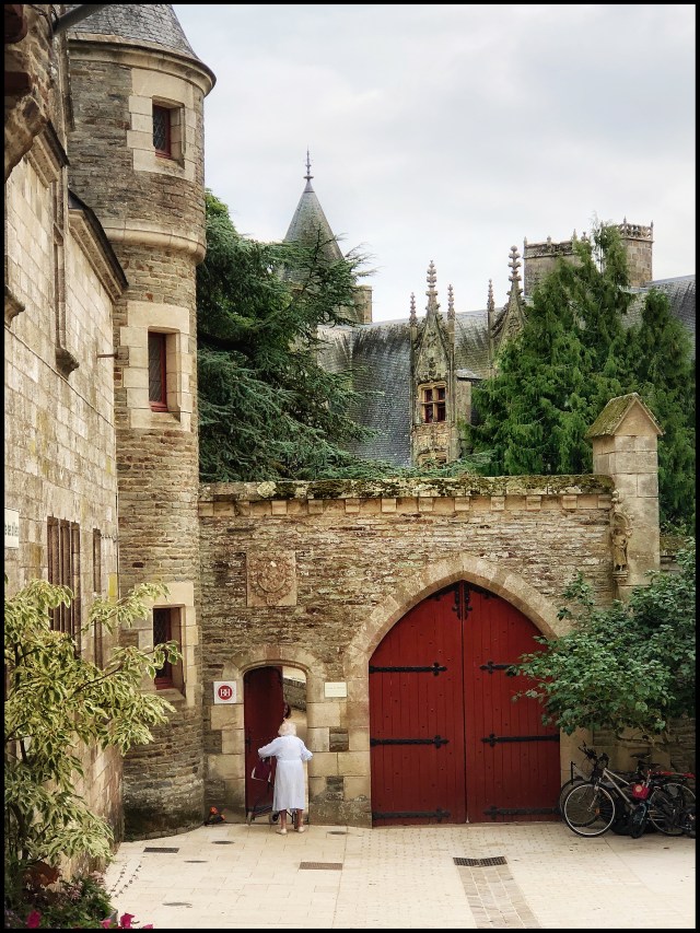 woman returning to her castle, josselin